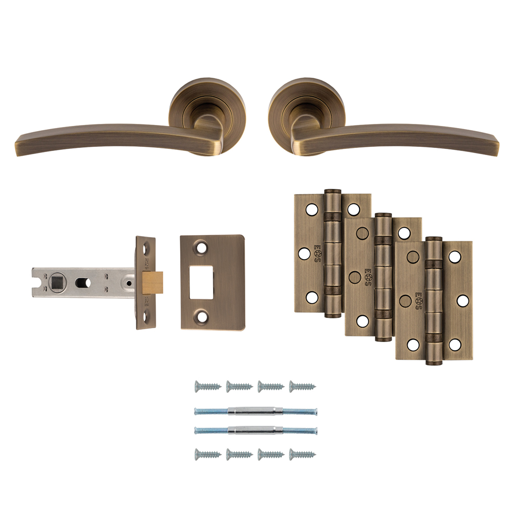 Tavira Lever Handle On Round Rose Antique Brass - Door Kit